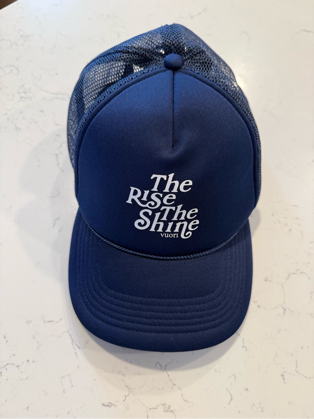 Vuori Navy Trucker Hat with The Rise The Shine